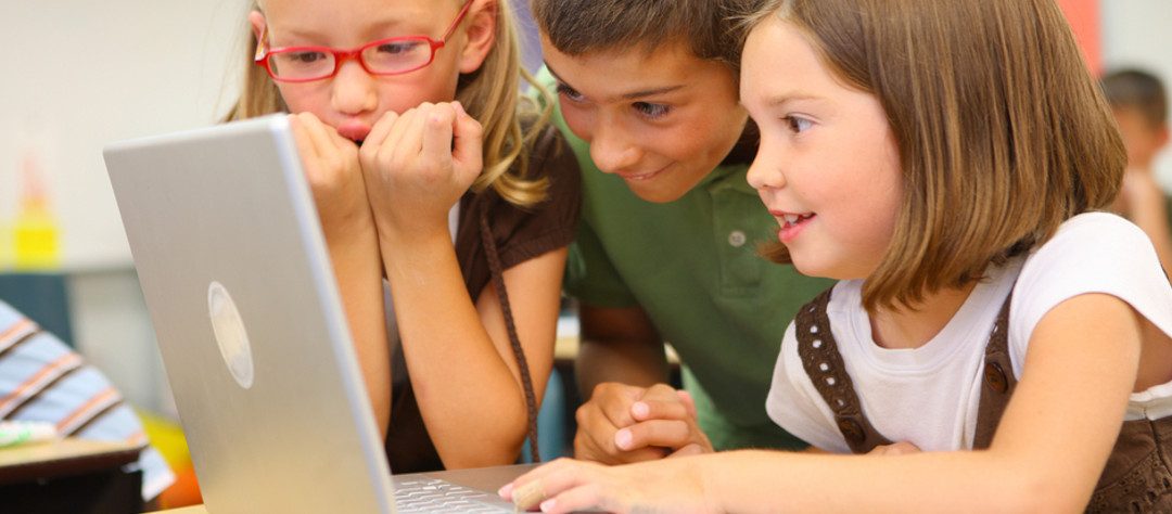 children round laptop screen